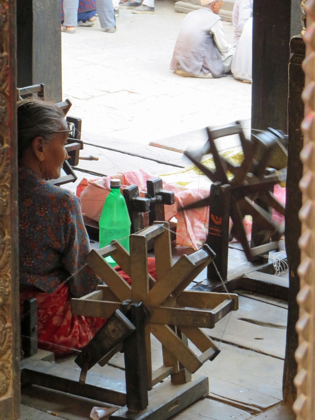 These women were spinning thread and weaving at a local neighborhood gathering place.