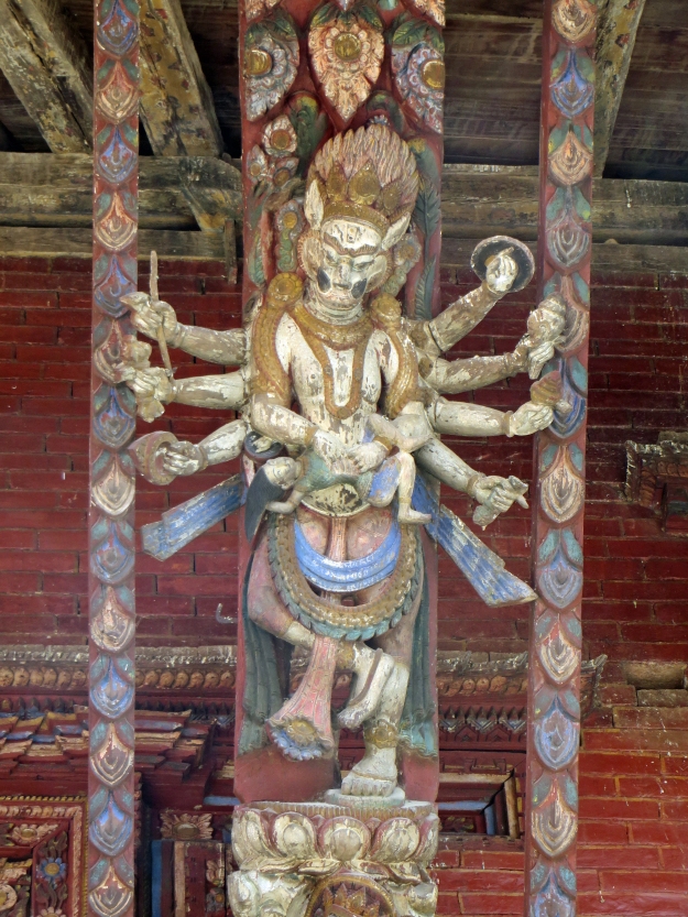 Many of the intricate wood carvings are painted, like this one.