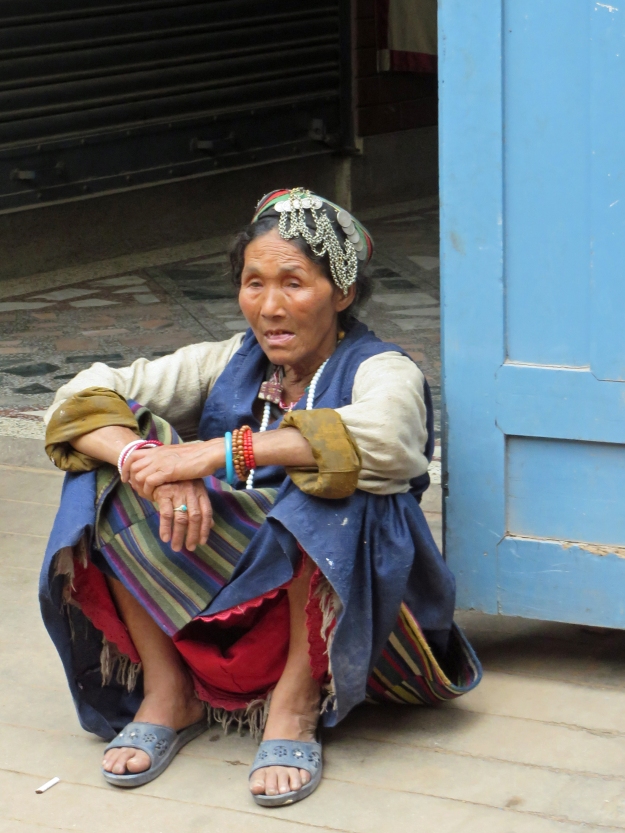 Nepal has a large Tibetan population - this lady's heritage shows both from the style of her clothing and her beautiful cheekbones.