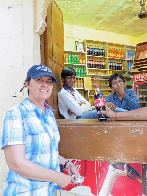I just had to try a Coke in India and these shop keepers were pretty tickled to sell one to me.