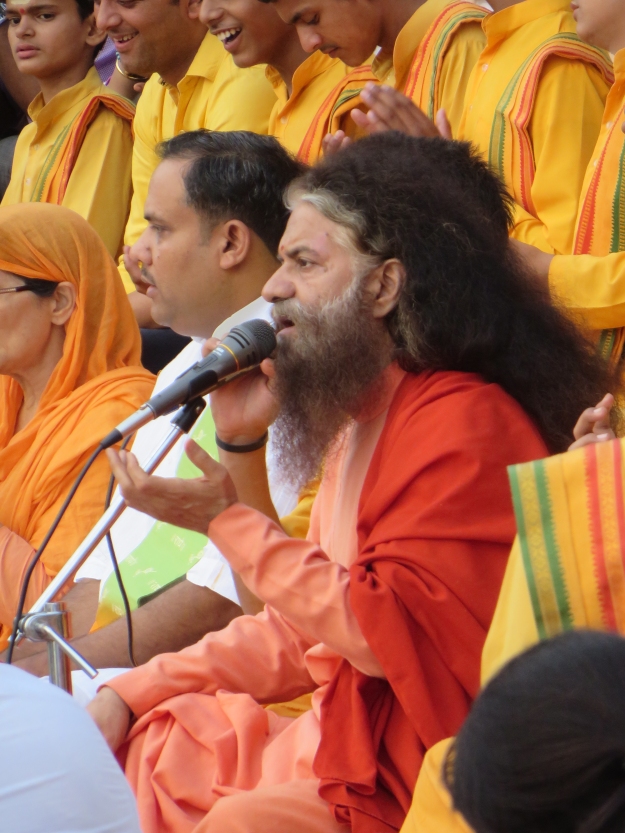 Swamiji loves to sing.  Here he is singing and chanting, along with the other singers and musicians at Parmarth.