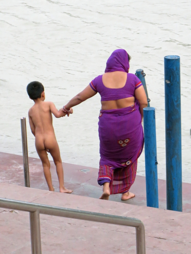 This kid did not want any part of going in the river, but his mom was insistent.