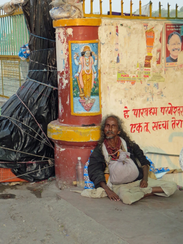 This fellow hasn’t woken up yet.  He looks road-weary and with reason.  It can’t be an easy to live on the road, subsist on donations, and eat what you get and when you can.  I have yet to see an overweight sadhu…