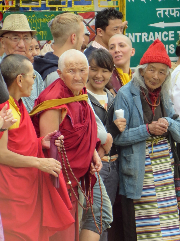 These folks are waiting for the Dalai Lama's return.  Doesn't the lady in the striped apron look as if she's stepped out of a fairy tale?