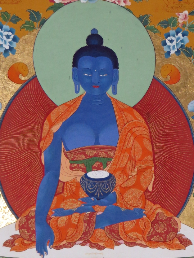 This is a thangka painting of the Medicine Buddha.
